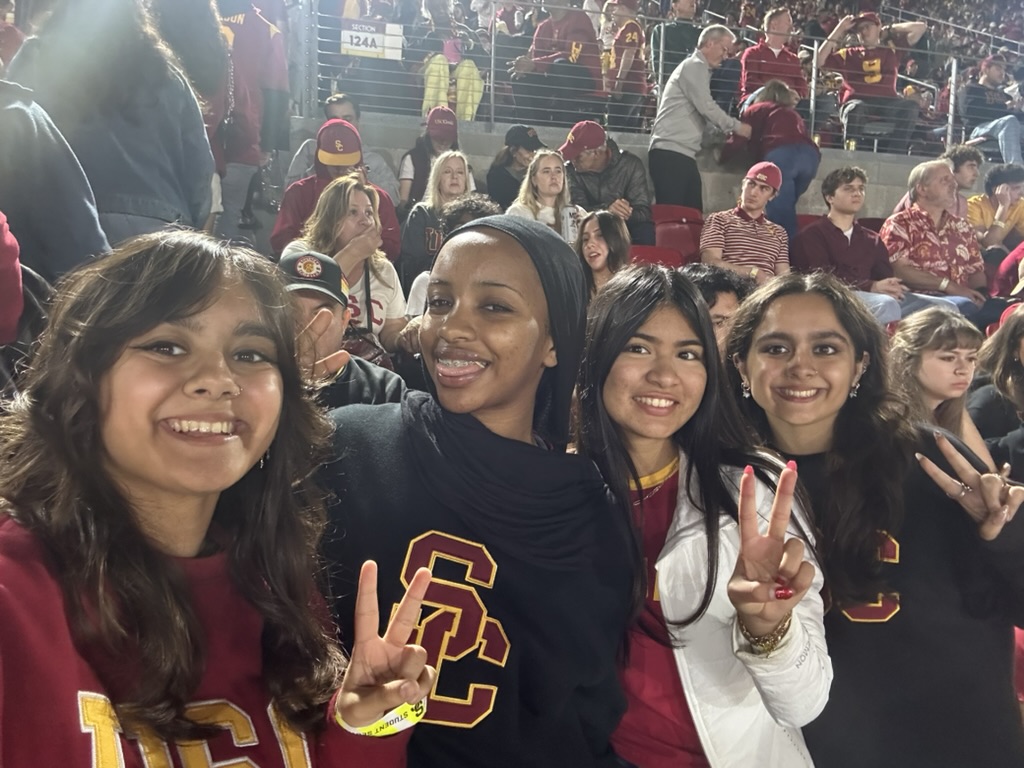 Reem Khan and friends at a USC football game